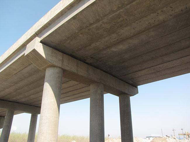 Retrofitting and repairing bridge cracks with carbon fiber reinforced polymer